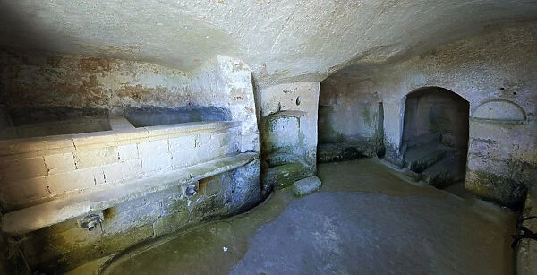 Interior of an ancient cave dwelling, known as Sassi, Sassi di Matera, Matera, Basilicata, Italy