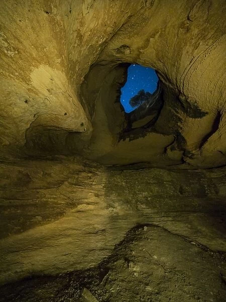 Interior during the night of the cave, Cueva Horadada, The Perforated one placed in the mount ArabAi. Heritage of the humanity. UNESCO