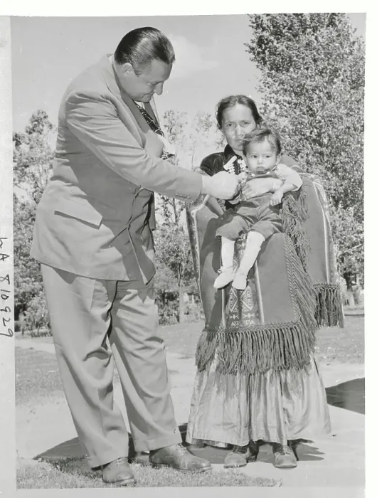 Framed Print : Interior Secretary Playing with Native American Infant Held by Mother Framed Print : Interior Secretary Playing with Native American Infant Held by Mother