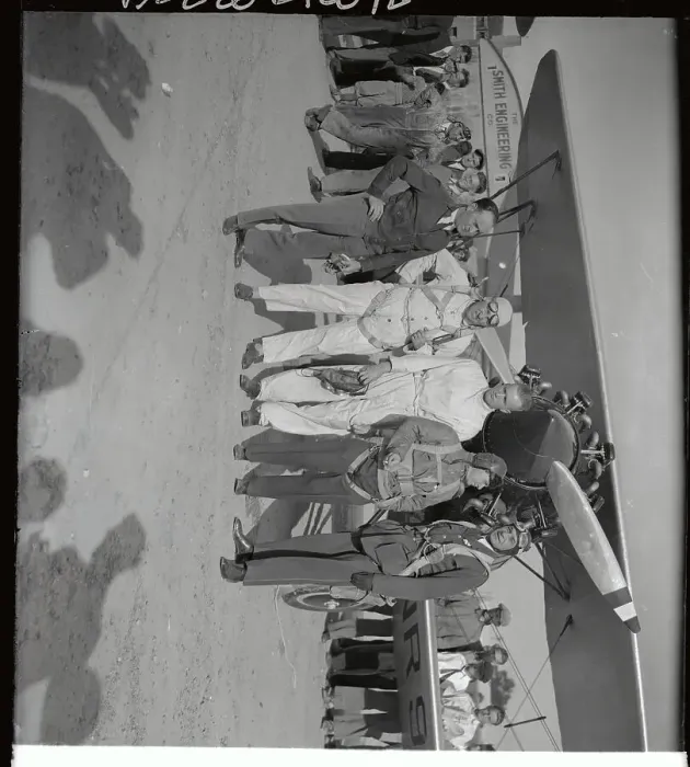 Framed Print : International Pilots Posing in Front of Plane