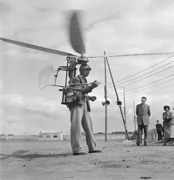 Framed Print : Inventor Demonstrating Strap-On Helicopter Framed Print : Inventor Demonstrating Strap-On Helicopter