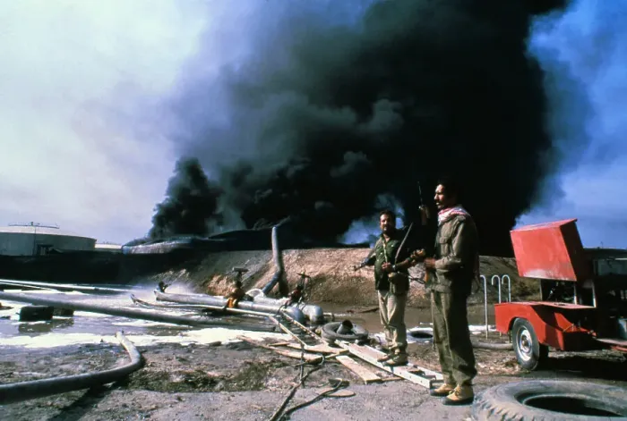 Framed Print : Iraqi Soldiers with Burning Storage Tanks Framed Print : Iraqi Soldiers with Burning Storage Tanks