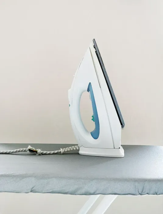Framed Print : Iron on ironing board Framed Print : Iron on ironing board
