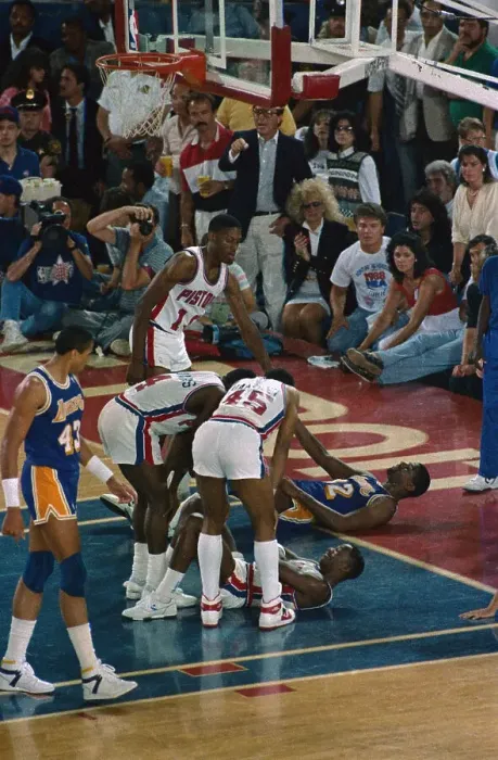 Framed Print : Isiah Thomas and Magic Johnson Being Helped up off the Floor Framed Print : Isiah Thomas and Magic Johnson Being Helped up off the Floor