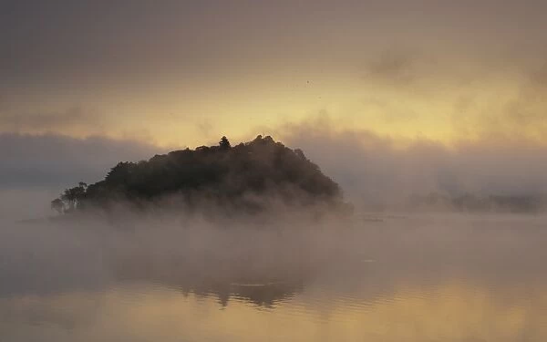 Island and morning mist at Kawaguchiko lake