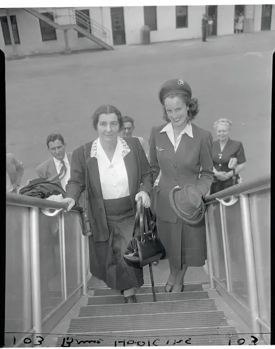 Framed Print : Israeli Ambassador Golda Meir Entering Airplane Alongside Stewardess Framed Print : Israeli Ambassador Golda Meir Entering Airplane Alongside Stewardess