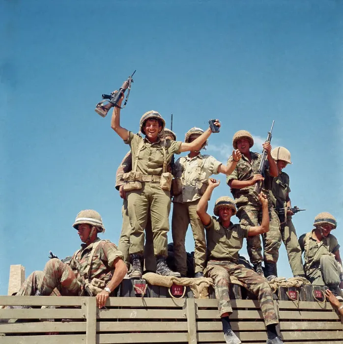 Framed Print : Israeli Troops Raising Weapons Overhead Framed Print : Israeli Troops Raising Weapons Overhead