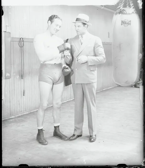 Framed Print : Jack Dempsey Examining Max Baer's Gloves Framed Print : Jack Dempsey Examining Max Baer's Gloves