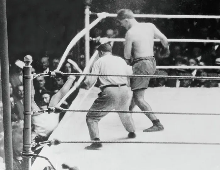 Framed Print : Jack Dempsey Falling Out of Boxing Ring