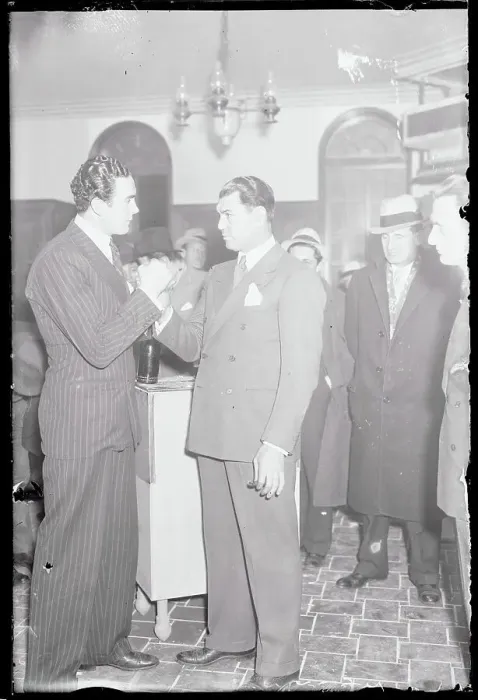 Framed Print : Jack Dempsey Holding Hand of Visiting Boxer Jack Doyle Framed Print : Jack Dempsey Holding Hand of Visiting Boxer Jack Doyle