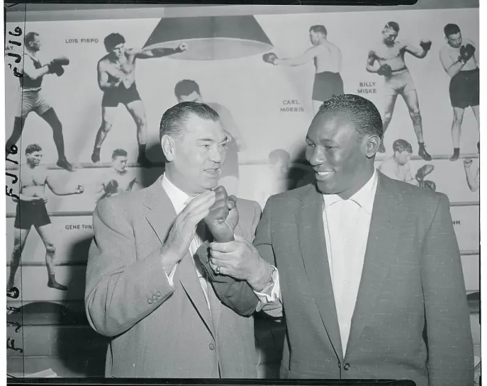 Framed Print : Jack Dempsey Holding Julio Mederos Hand Framed Print : Jack Dempsey Holding Julio Mederos Hand