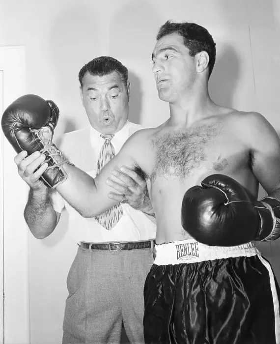 Framed Print : Jack Dempsey Looking Rocky Marciano's Arm Framed Print : Jack Dempsey Looking Rocky Marciano's Arm