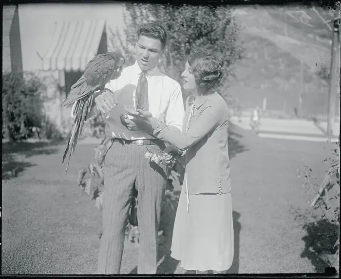 Framed Print : Jack Dempsey with Parrrot and Wife Framed Print : Jack Dempsey with Parrrot and Wife