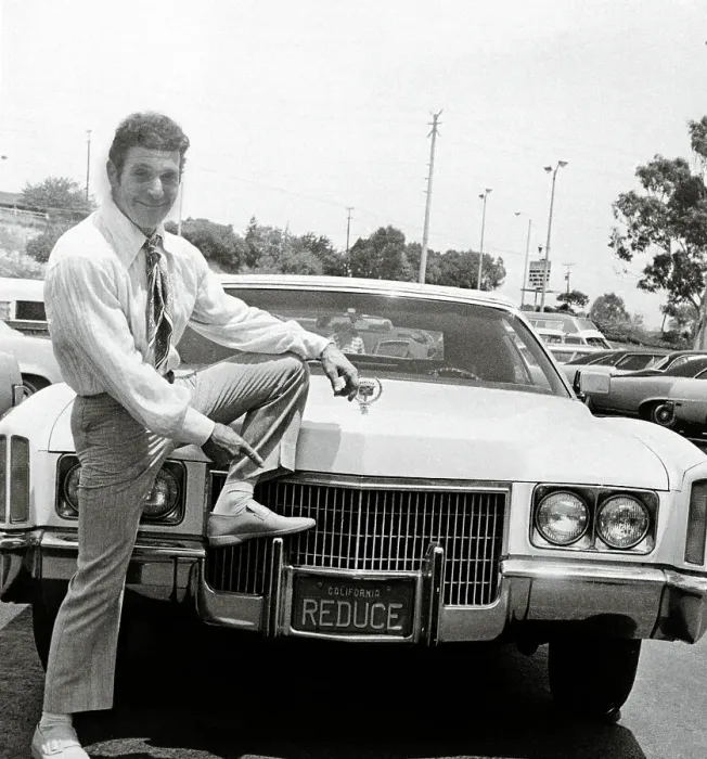 Framed Print : Jack LaLanne Posing with His Car Framed Print : Jack LaLanne Posing with His Car