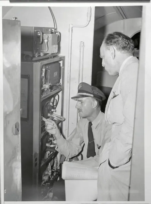 Framed Print : Jack Le Claire and James M Landis Inspecting Airplane Radar Framed Print : Jack Le Claire and James M Landis Inspecting Airplane Radar