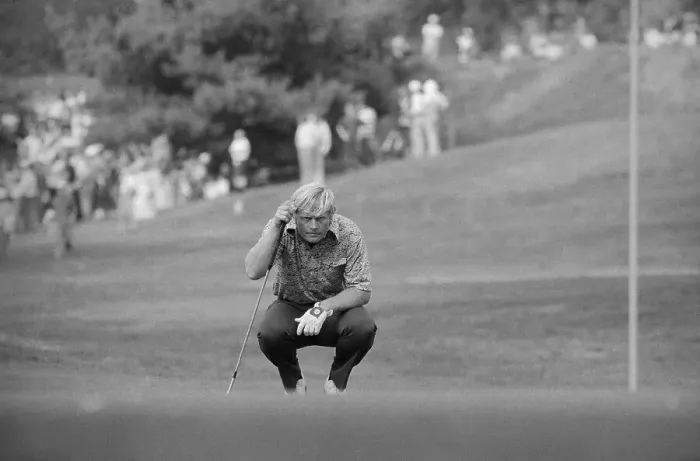 Framed Print : Jack Nicklaus Squatting on Golf Course