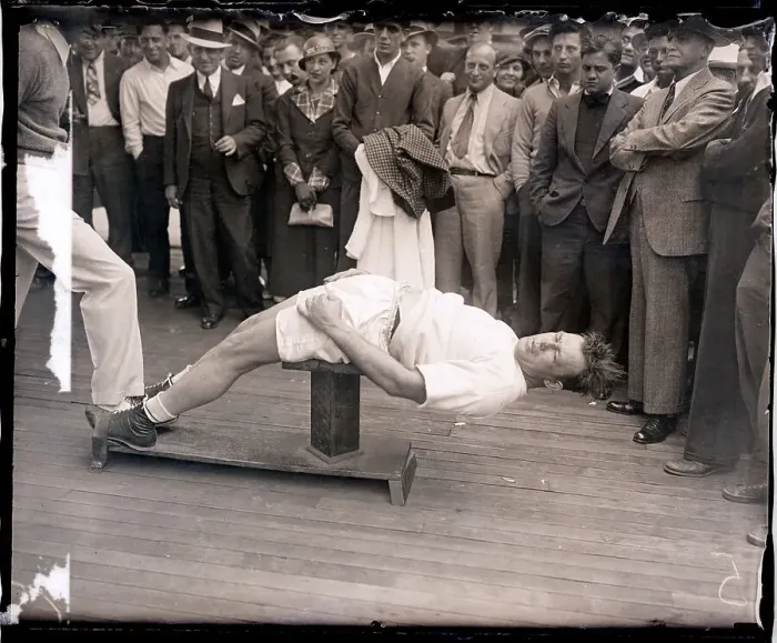 Framed Print : Jack Sharkey Doing Sit-Ups on Post Framed Print : Jack Sharkey Doing Sit-Ups on Post