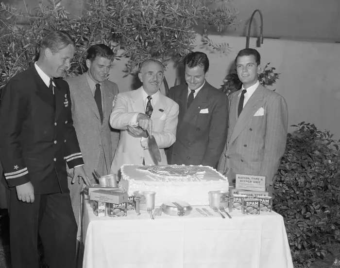 Framed Print : Jack Warner Cutting a Cake Framed Print : Jack Warner Cutting a Cake