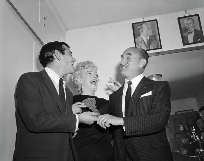 Framed Print : Jack Warner Kisses Marilyn Monroe Framed Print : Jack Warner Kisses Marilyn Monroe