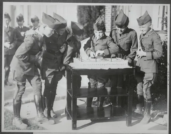 Framed Print : Jackie Coogan Cutting Cake at Military Academy Framed Print : Jackie Coogan Cutting Cake at Military Academy