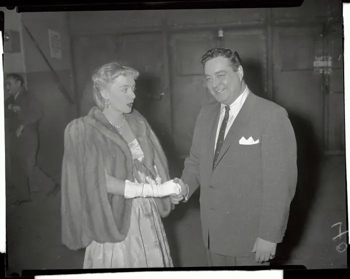 Framed Print : Jackie Gleason Holding Hand of Christine Jorgensen Framed Print : Jackie Gleason Holding Hand of Christine Jorgensen
