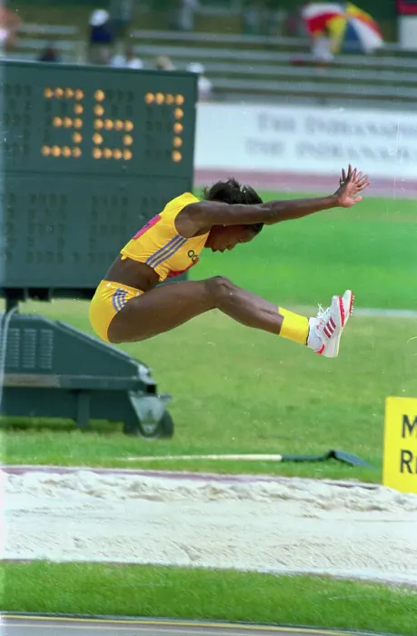 Framed Print : Jackie Joyner-Kersee Sailing Through the Air Framed Print : Jackie Joyner-Kersee Sailing Through the Air