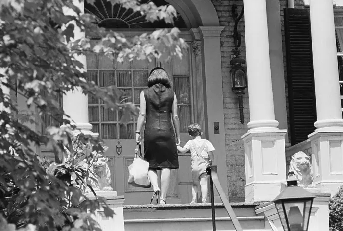 Framed Print : Jackie Kennedy and Son on Porch