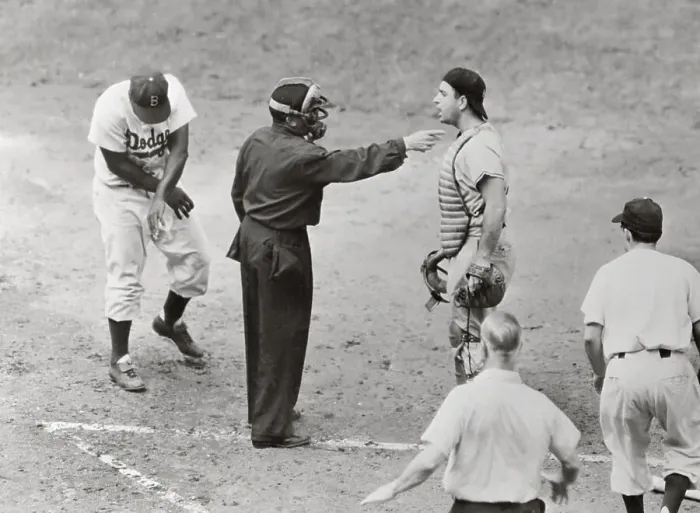 Framed Print : Jackie Robinson Examining Arm and Umpire Pointing at Catcher