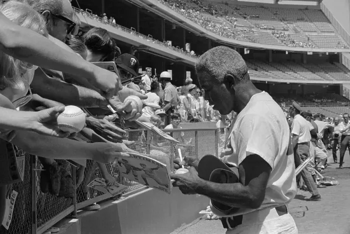 Framed Print : Jackie Robinson Signing Autographs Framed Print : Jackie Robinson Signing Autographs