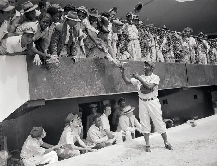 Framed Print : Jackie Robinson Signing Autographs from Field Framed Print : Jackie Robinson Signing Autographs from Field