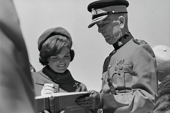 Framed Print : Jacqueline Kennedy Signing a Visitor's Book