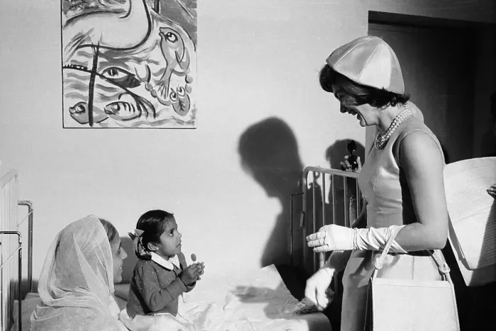 Framed Print : Jacqueline Kennedy Smiling After Giving a Lollipop to a Child Framed Print : Jacqueline Kennedy Smiling After Giving a Lollipop to a Child