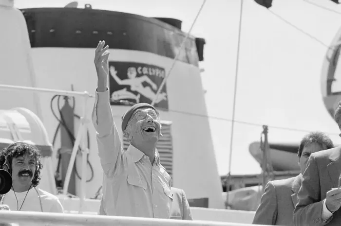 Framed Print : Jacques Cousteau Waving from Large Boat Framed Print : Jacques Cousteau Waving from Large Boat