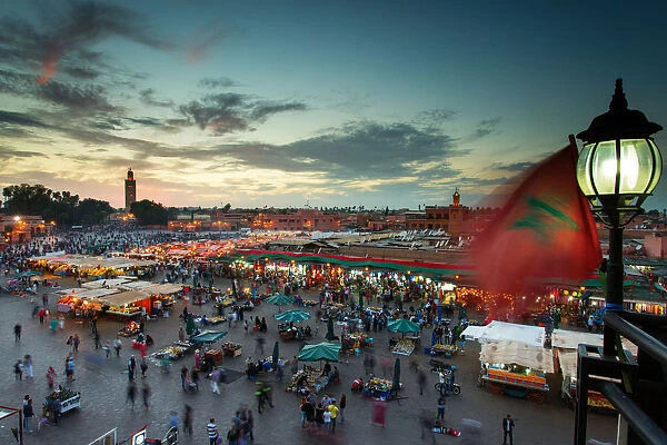 Jamaa el Fna (also Jemaa el-Fnaa, Djema el-Fna or Djemaa el-Fnaa) is a square and market place in Marrakeshs medina quarter (old city) with Koutubia in background. Marrakesh, Morocco, north Africa