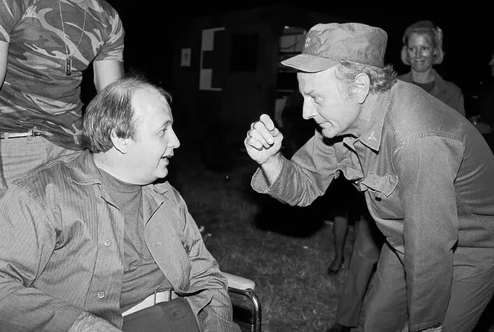 Framed Print : James Brady Chatting with Larry Linville Framed Print : James Brady Chatting with Larry Linville