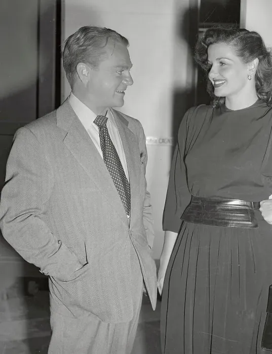 Framed Print : James Cagney Smiling at Woman Framed Print : James Cagney Smiling at Woman