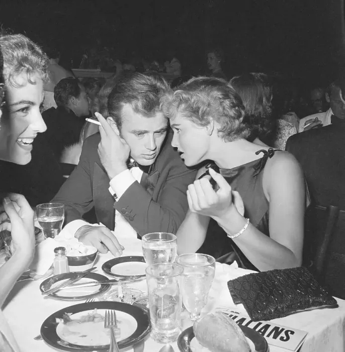 Framed Print : James Dean Seated at Dinner with Ursula Andress Framed Print : James Dean Seated at Dinner with Ursula Andress