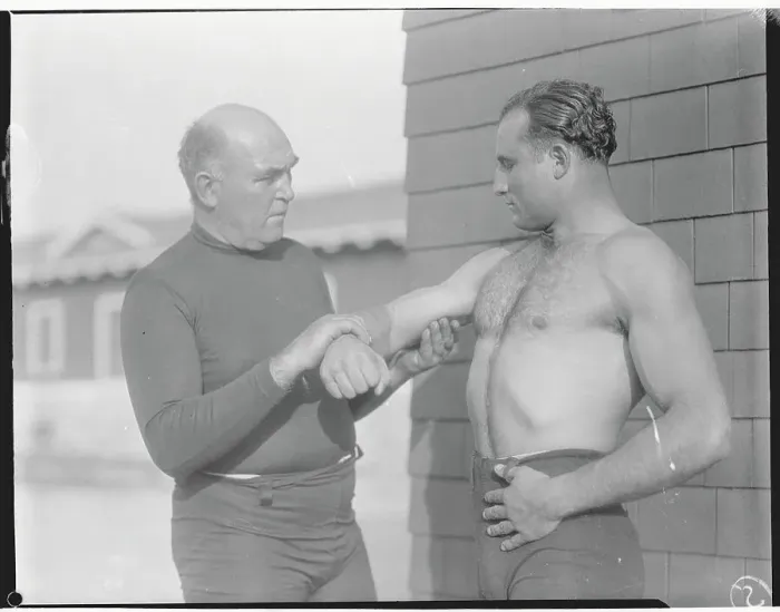 Framed Print : James J. Jeffries Feeling the Biceps of Albert Morro