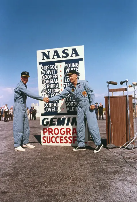Framed Print : James Lovell and Buzz Aldrin Shaking Hands at NASA Sign Framed Print : James Lovell and Buzz Aldrin Shaking Hands at NASA Sign