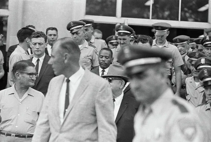 Framed Print : James Meredith Walking with Police