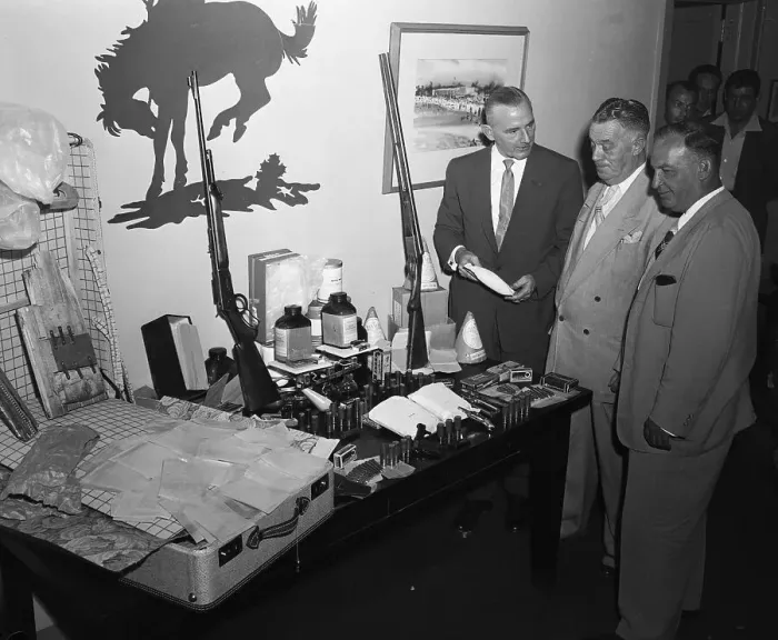 Framed Print : James Ryan Looking Over Confiscated Narcotics