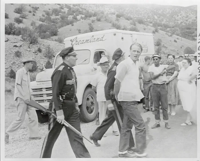 Framed Print : James Upton Being Escorted to a Police Car Framed Print : James Upton Being Escorted to a Police Car