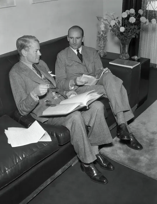 Framed Print : James Whale Discussing Film Script Framed Print : James Whale Discussing Film Script
