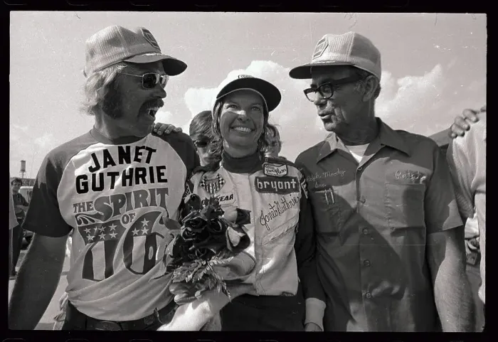 Framed Print : Janet Guthrie with Roses and Crew