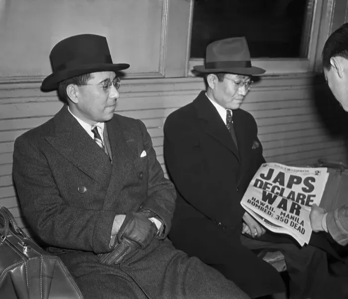 Framed Print : Two Japanese Men Looking at Newspaper Framed Print : Two Japanese Men Looking at Newspaper