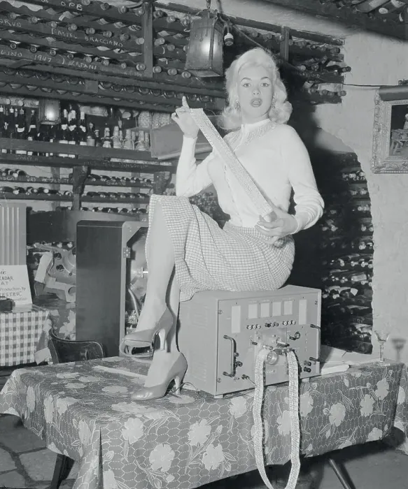 Framed Print : Jayne Mansfield Holding a Piece of Robotester Tape Framed Print : Jayne Mansfield Holding a Piece of Robotester Tape
