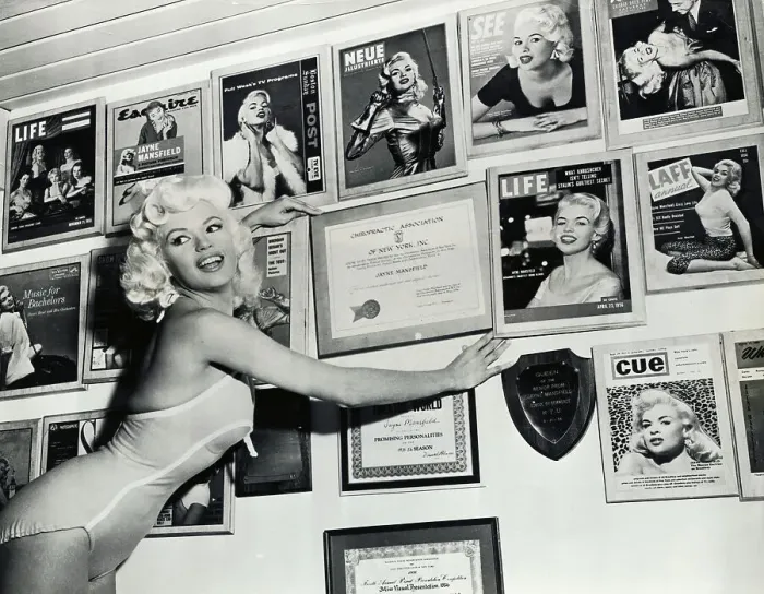 Framed Print : Jayne Mansfield with Wall Display of Awards and Covers Framed Print : Jayne Mansfield with Wall Display of Awards and Covers