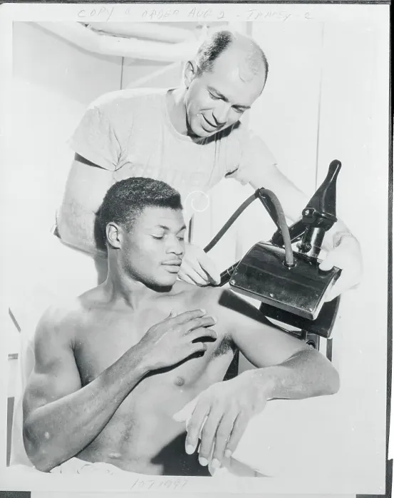 Framed Print : JC Caroline Getting Shoulder Treated by Dick Klein Framed Print : JC Caroline Getting Shoulder Treated by Dick Klein