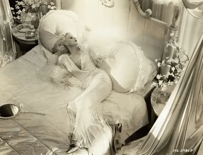 Framed Print : Jean Harlow Lounging on Bed Framed Print : Jean Harlow Lounging on Bed
