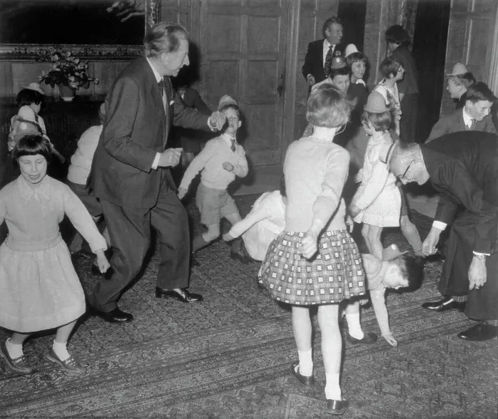 Framed Print : Jean Paul Getty Dancing with Children Framed Print : Jean Paul Getty Dancing with Children